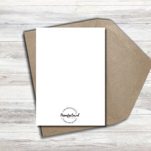 May include: Blank white card with a brown envelope. The card has a black circle logo with the text "Manufactured by Me" inside.