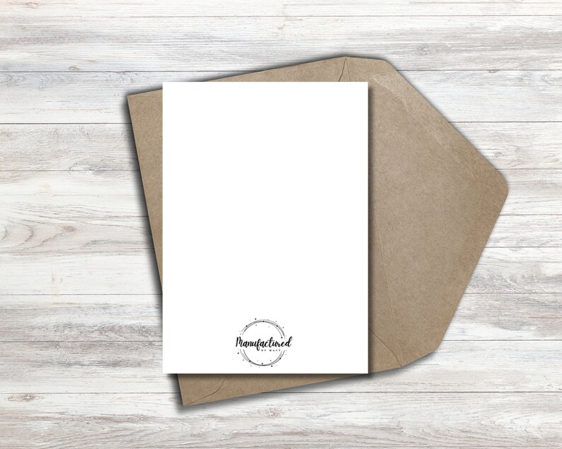 May include: Blank white card with a brown envelope. The card has a black circle logo with the text "Manufactured by Me" inside.
