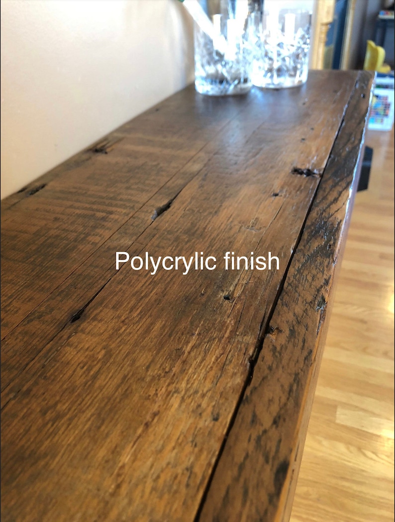 May include: A close-up of a wooden shelf with a polycrylic finish. The shelf is made of reclaimed wood and has a rustic look.