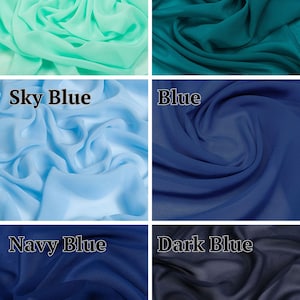 May include: A grid of six fabric swatches in various shades of blue and green. The colours are labelled Mint, Dark Turquoise, Sky Blue, Blue, Navy Blue, and Dark Blue. Each section displays a sheer, lightweight textile with soft, flowing folds.