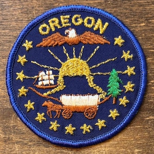 Parche de recuerdo de viaje vintage con el sello del estado de Oregón de Andre Patches.