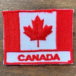 Canadian Flag Vintage Travel Souvenir Patch by Voyager - New in Original Package