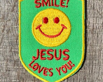 Le! Jesus älskar dig Vintage souvenirmärke från Voyager