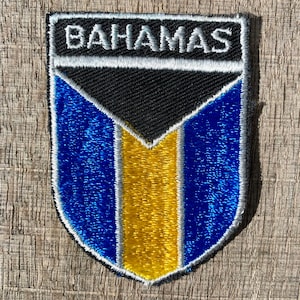 Parche de recuerdo de viaje vintage con la bandera de las Bahamas de Voyager