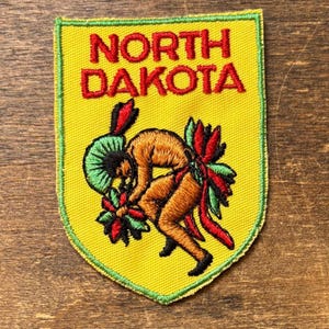 North Dakota Vintage Souvenir Resetygmärke från Voyager