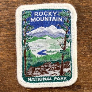 Toppa ricordo da viaggio del Parco Nazionale delle Montagne Rocciose, Colorado, di Fasco