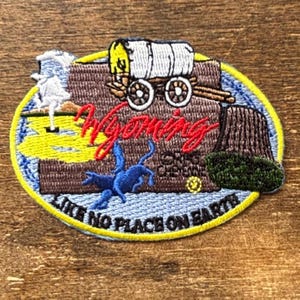 Écusson de voyage souvenir comme nulle part ailleurs sur Terre, Wyoming de Rushmore, photo et cadeaux