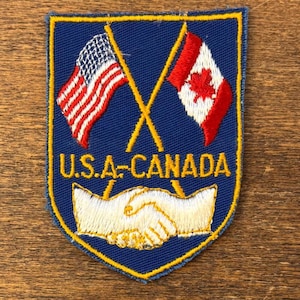 U.S.A.-Canada Vintage Travel Souvenir Patch by Voyager