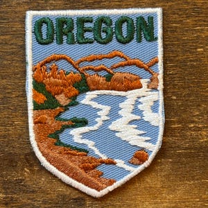 Parche de recuerdo de viaje vintage de Oregón de Voyager