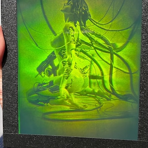 Vero ologramma laser 3D. Ghost in the Shell. Bellezza al comando. Vintage. Movimento.