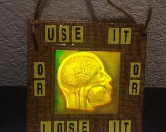 3D collage with brain hologram -"Use it or lose it"