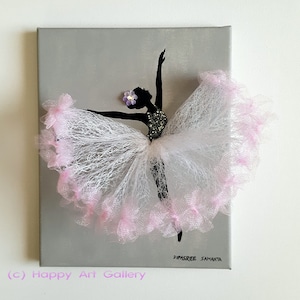 May include: A gray canvas painting with a black silhouette of a ballerina wearing a pink and white tulle tutu. The ballerina has a purple flower on her head. The painting is signed "Dipasree Samanta" in the bottom right corner. (c) Happy Art Gallery