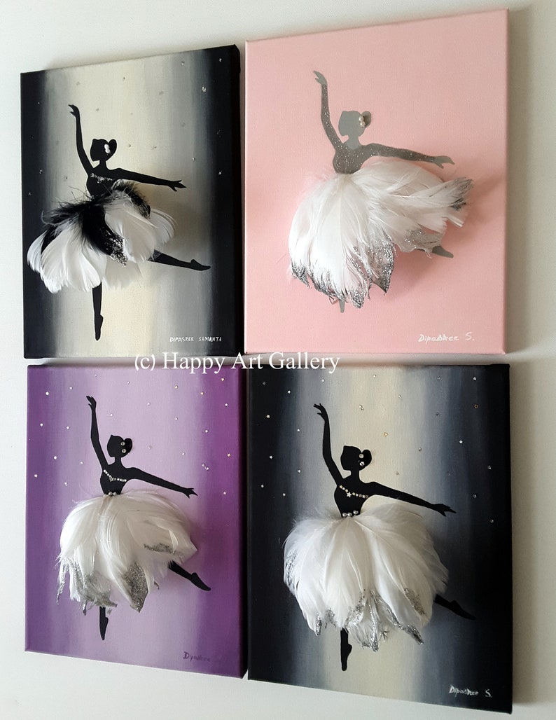 May include: Four square canvases with a ballerina silhouette painted on each. The ballerina is wearing a white feather tutu and a silver glitter bodice. Each canvas has a different background color: black, pink, purple, and gray. The text "Happy Art Gallery" is printed below the canvases.