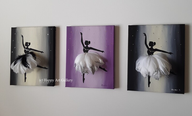 May include: Three canvas paintings of a ballerina silhouette with a white feather tutu. The ballerina is in a dancing pose with her arms raised. The backgrounds are a gradient of purple, black and white.
