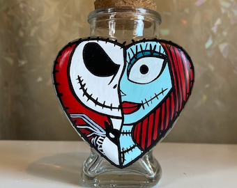 Pequeño frasco de vidrio rellenable con forma de corazón inspirado en Jack y Sally