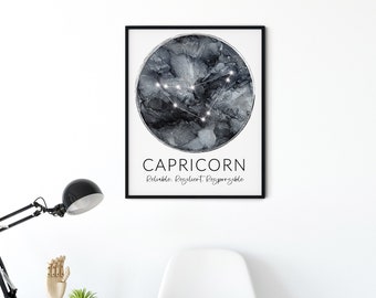 May include: A framed Capricorn zodiac art print. The artwork features a dark, marbled background with a constellation design. The word "CAPRICORN" is printed below the constellation, along with the words "Reliable. Resilient. Responsible."