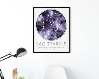 May include: A framed Sagittarius zodiac art print. The artwork features a purple and black watercolour background with the Sagittarius constellation in white. The text "SAGITTARIUS" and related adjectives are below the image.