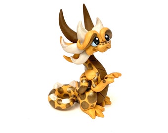 Macchiato | Polymer Clay Dragon Dice Holder Figurine | Gold, Hazelnut, and White Pearl Dragonling Sculpture