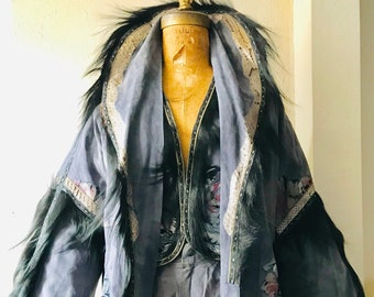 ROBERTO CAVALLI 1970  An epic three piece ensemble A suede overcoat with fur trim floral snakeskin  trim leather suede vest matching trouser