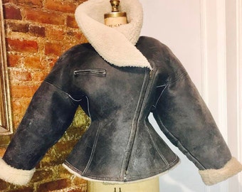 AZZEDINE ALAIA couture 1980 runway leather motorcycle bomber hourglass jacket one of a kind Made in France Museum historic