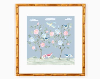 May include: A framed art print featuring a watercolor illustration of a serene garden scene. The artwork showcases flowering trees with pink and blue blossoms, birds, and a light blue background. The frame is a gold bamboo style.
