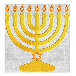 May include: A gold menorah with seven candles, a star of David, and a base. The menorah is on a white linen background.