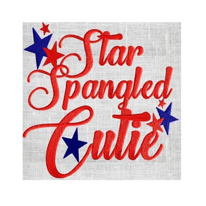 May include: Red and blue embroidered design with the text "Star Spangled Cutie" and stars.