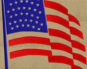 May include: A red, white, and blue American flag embroidered on a beige fabric background. The flag is waving in the wind.