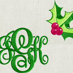 May include: Green embroidered monogram "KFH" with a green holly sprig and red berries.