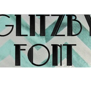May include: Black and white text on a teal and white chevron background. The text reads "Glitzy Font".