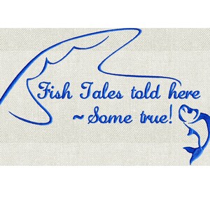 May include: Blue embroidered design of a fishing rod with a fish on the hook. The text reads "Fish Tales told here ~ some true!"