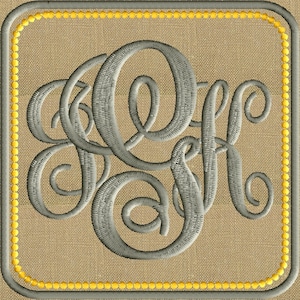 May include: A gray monogram with the letters "J.K." embroidered on a beige burlap background. The monogram is surrounded by a yellow border.