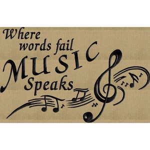 May include: A beige fabric background with black embroidery that reads "Where words fail MUSIC speaks" with a treble clef and musical notes.