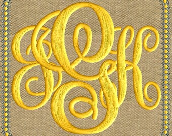 May include: A yellow embroidered monogram with the letters "KAF" on a beige burlap background. The monogram is surrounded by a gray and yellow border.