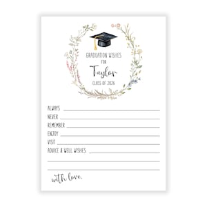 May include: A white graduation card with floral wreath and a graduation cap illustration. Text reads "Graduation Wishes for Taylor, Class of 2026." Includes prompts for advice and well wishes, ending with "with love."