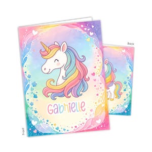 May include: A rectangular notebook featuring a white unicorn with a rainbow-colored mane and a gold horn. The cover displays the name Gabrielle in colorful letters, surrounded by a pastel watercolor background with small hearts and swirling patterns.