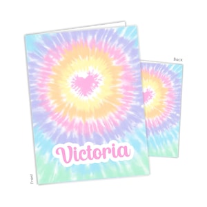 May include: A tie-dye patterned card with a pink heart in the center and the name "Victoria" in pink text. The back of the card has the same tie-dye pattern.