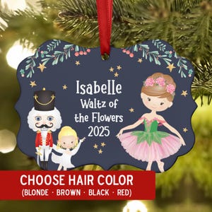 May include: Navy blue ornament with a red ribbon, featuring a ballerina, nutcracker, and text "Isabelle Waltz of the Flowers 2025". The bottom banner reads "CHOOSE HAIR COLOR (BLONDE • BROWN • BLACK • RED)".
