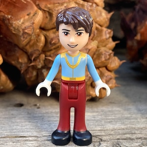 Prince Charming in a light blue top, part of Disney LEGO® collection, genuine LEGO® minifigure.