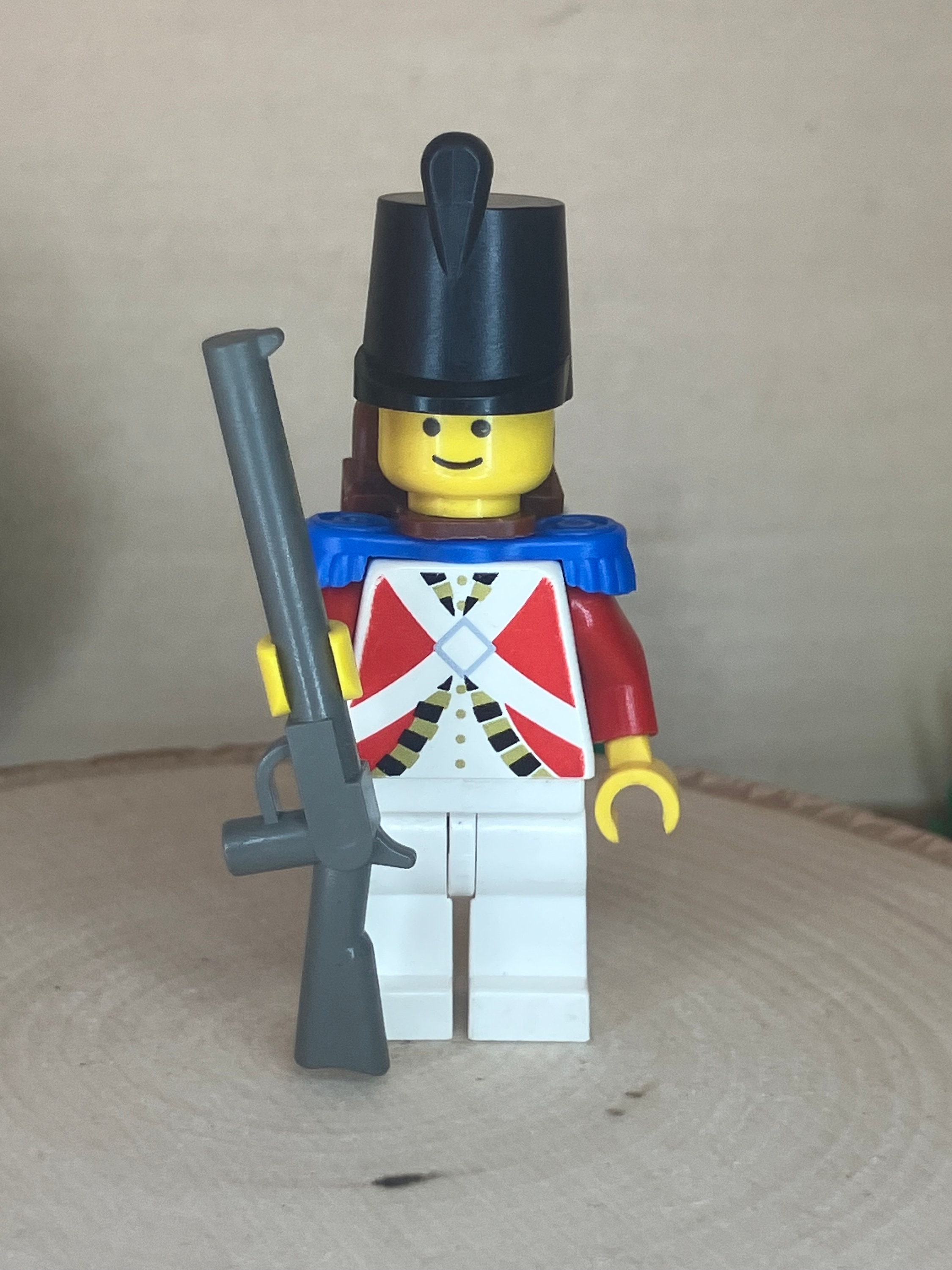 Imperial Guard With Blue Epaulettes and Brown Backpack Holding a