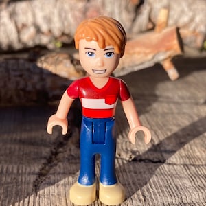 Henry wearing a Dark Red Polo Shirt and Dark Blue Pants - Friends, Genuine LEGO® Minifigure