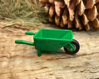 Green Minifigure Wheelbarrow Frame with Medium Stone Gray Pulley Wheel and Black Tire - Genuine LEGO® Accessory