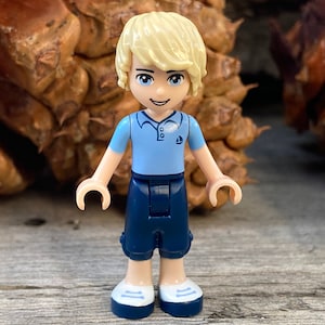 Andrew wearing Dark Blue Cropped Trousers and a Bright Light Blue Polo Shirt - Friends, Genuine LEGO® Minifigure