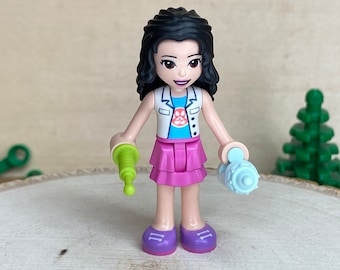 Emma in Dark Pink Layered Skirt and Paw Print Top with Bottle and Syringe – Friends Genuine LEGO® Minifigure