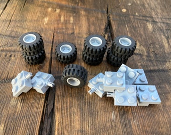 Juego de ruedas, banda de rodadura desplazada de 21 mm x 12 mm con soporte de eje de rueda 2x2, paquete de 8 - Piezas originales de vehículos LEGO®