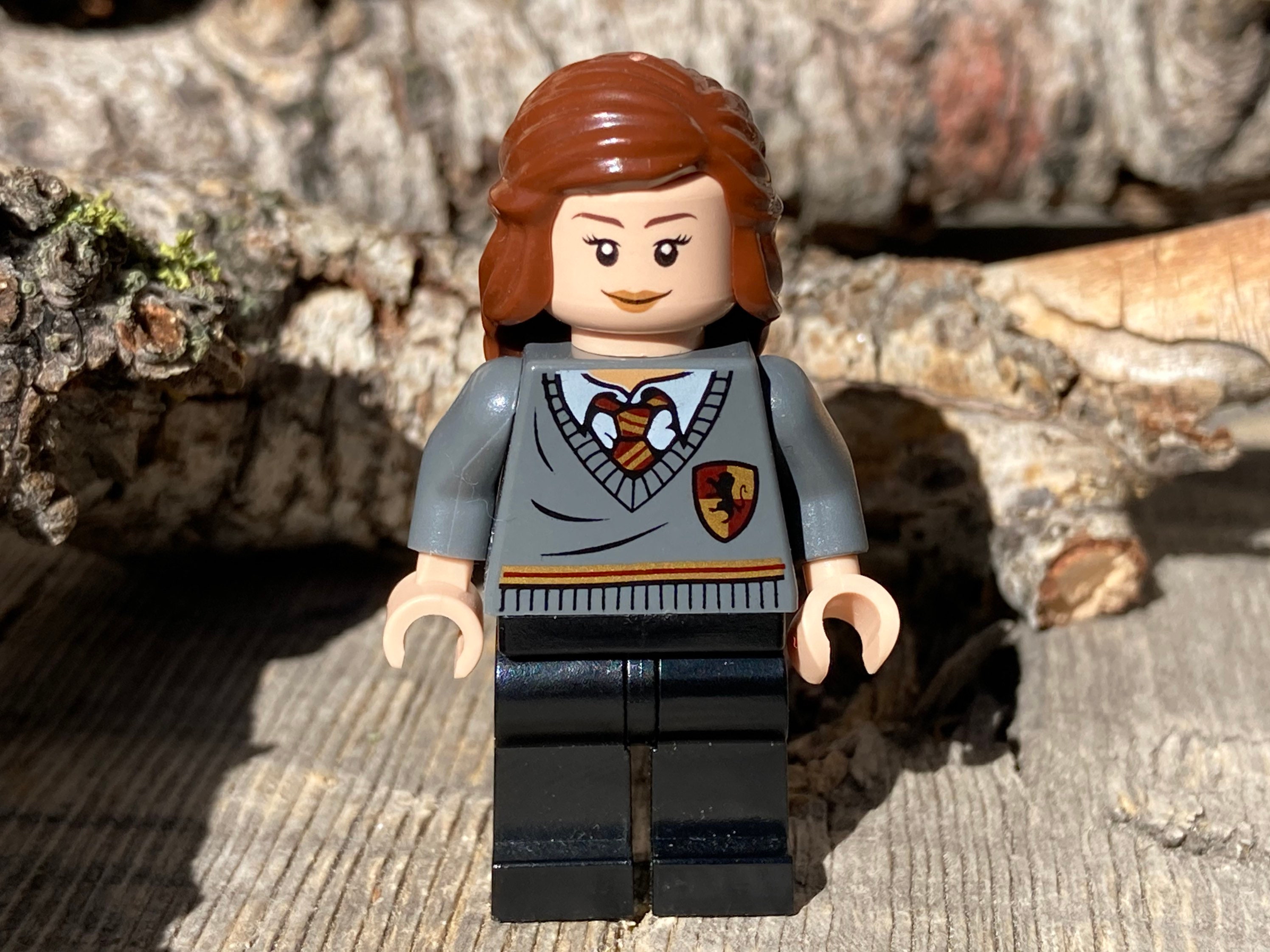 Hermione Granger Wearing a Gryffindor Stripe and Shield Sweater