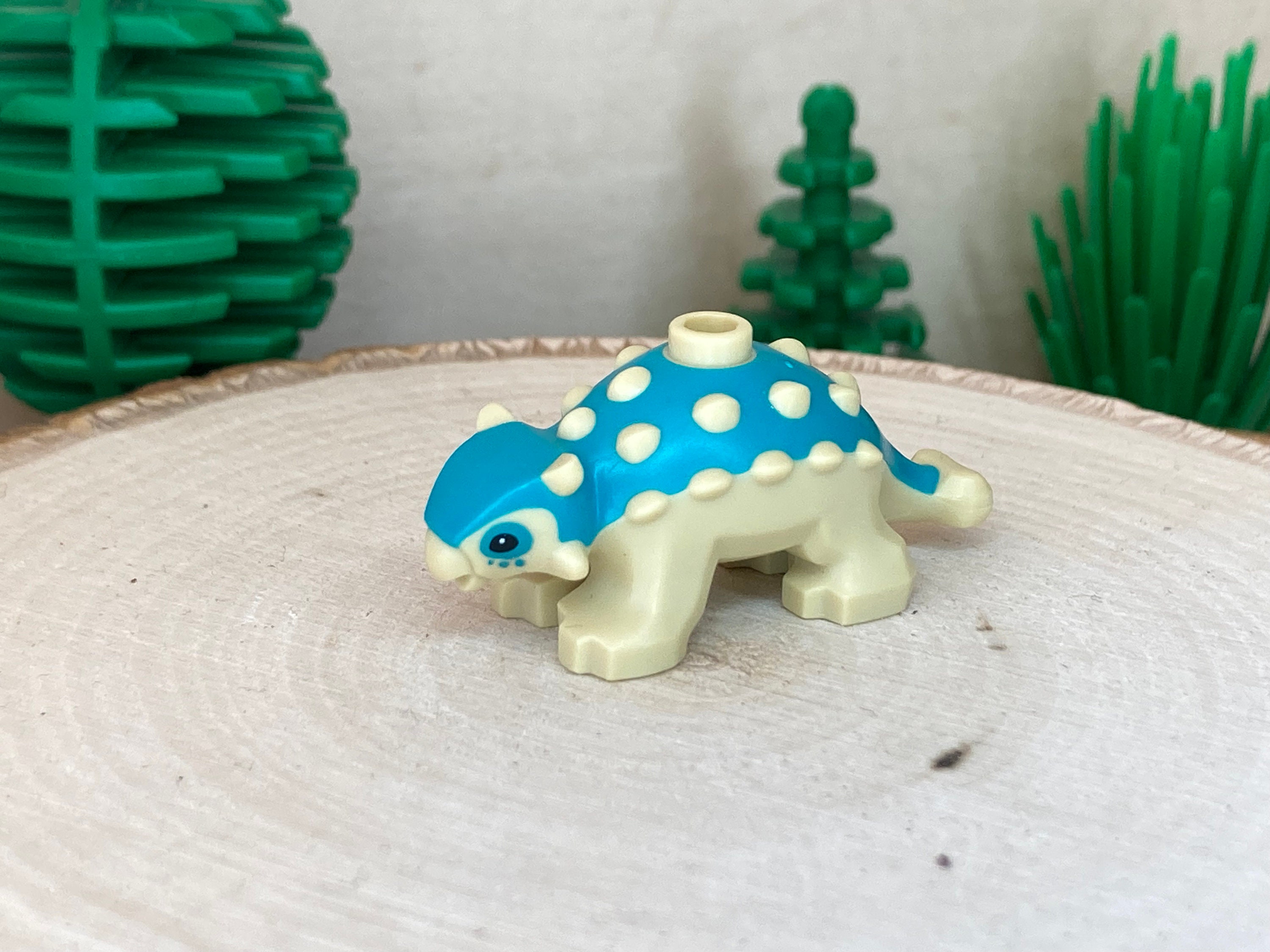 Dinosaur Ankylosaurus Baby With Dark Turquoise Back and Black Eyes