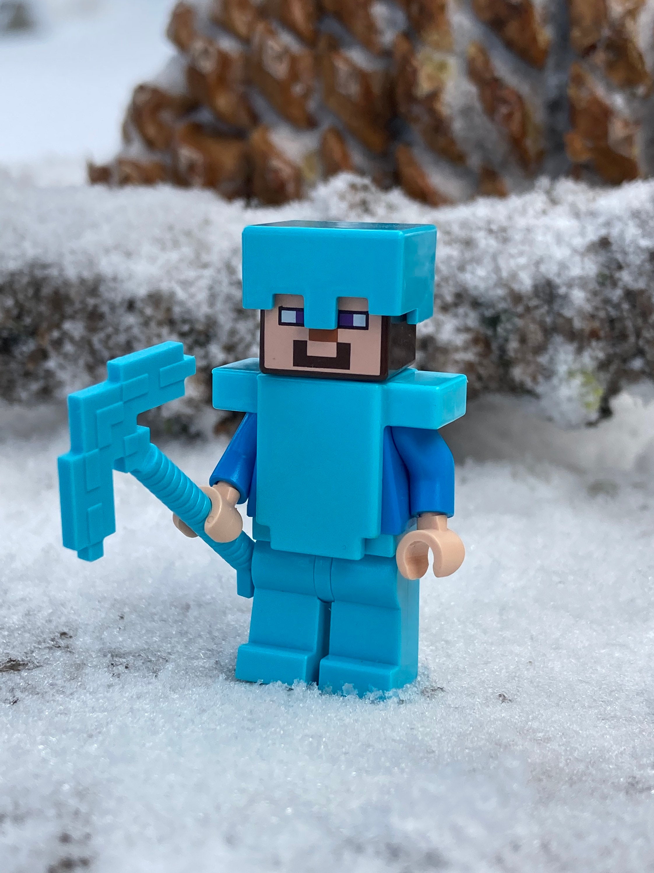 Steve Wearing Medium Azure Armor Holding a Pickaxe - Genuine LEGO