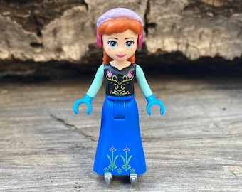 Anna wearing a Black and Blue outfit and Ice Skates - Disney Princess: Frozen - Genuine LEGO® Minifigure