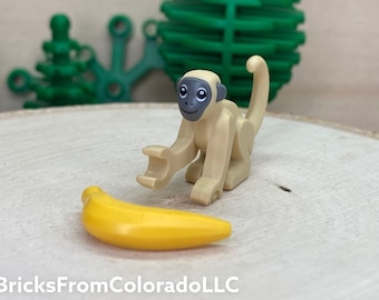 Tan Monkey with Molded Dark Bluish Gray Face and Ears with a Banana - Genuine LEGO® Animal